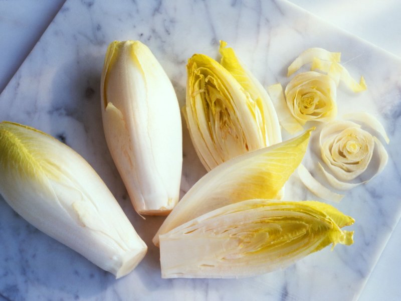 chicory-whole-and-sliced-on-marble-board-126551420-58bdd3d85f9b58af5c3bf47b